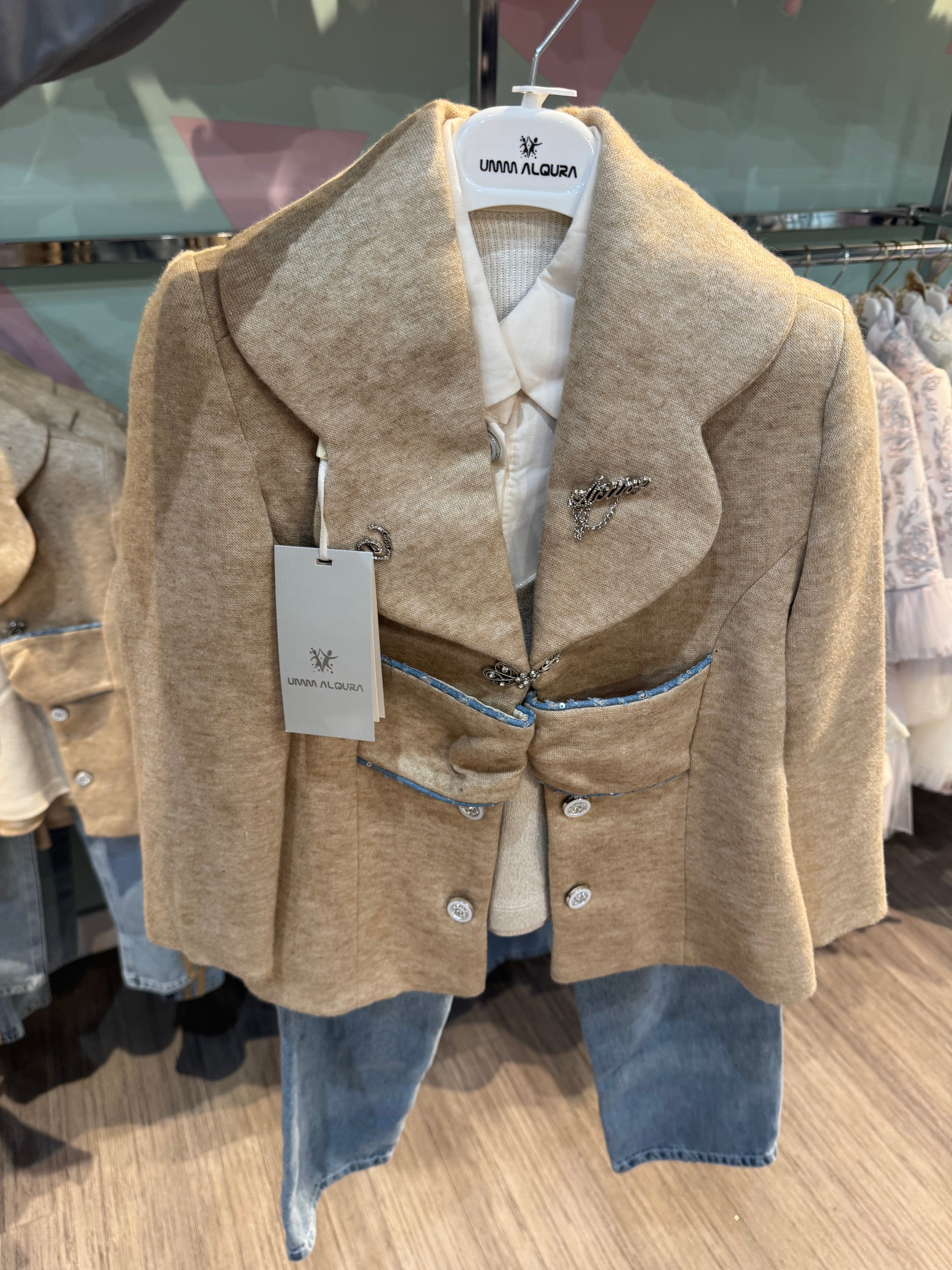 over coat, top and jeans