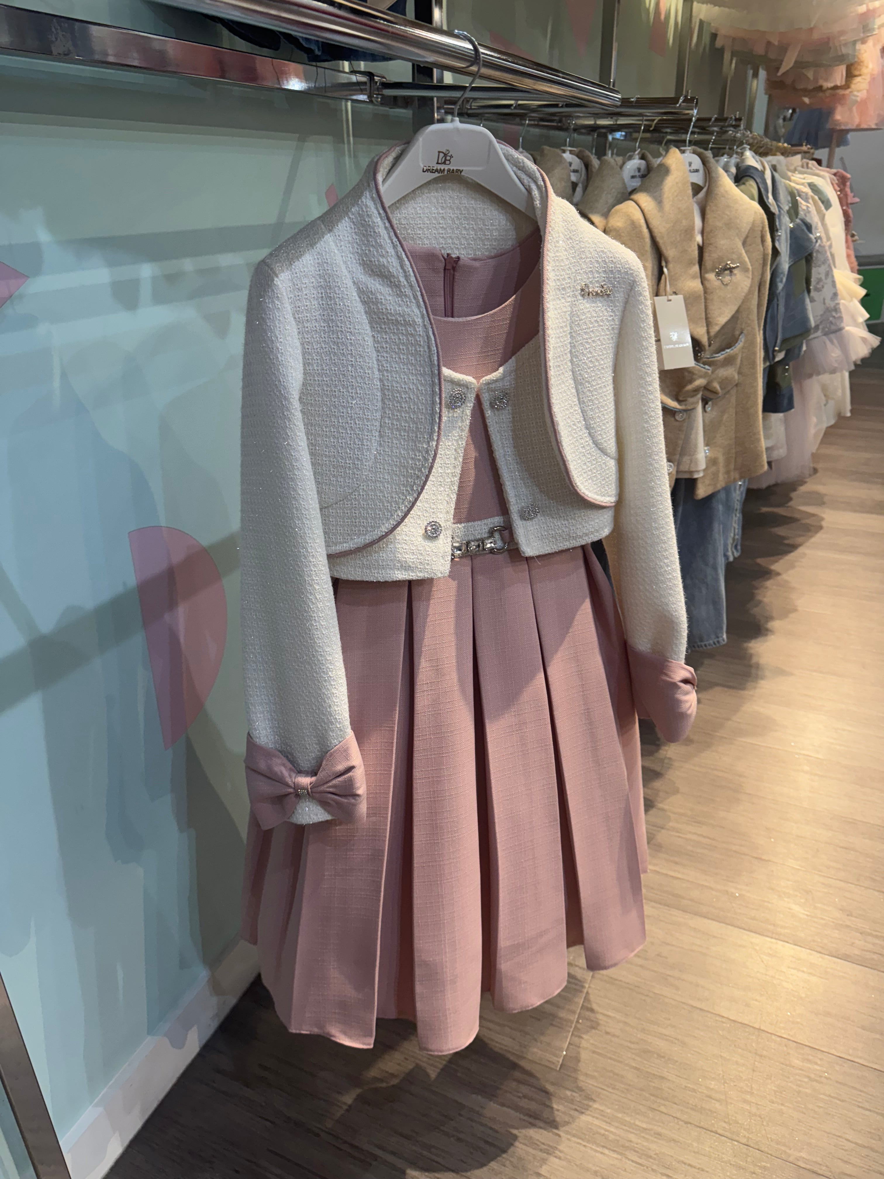 pink dress with white overcoat bow